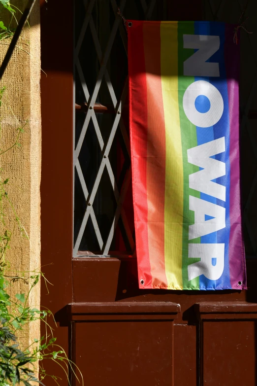 there is a flag on the door of a house