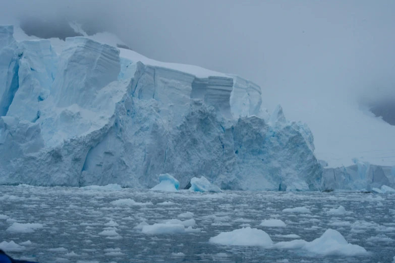 an iceberg has a large hole on it