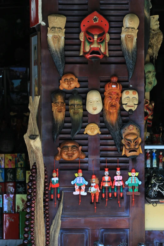 an elaborate display on display with wooden masks