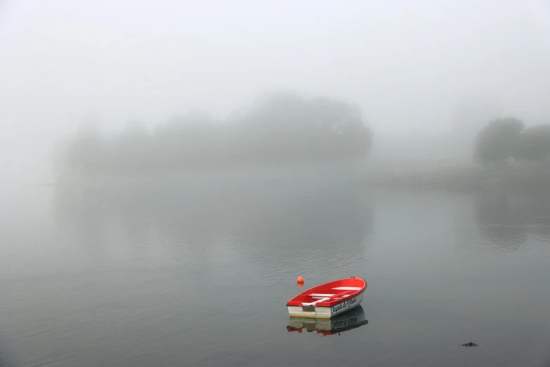 a small house in a large body of water