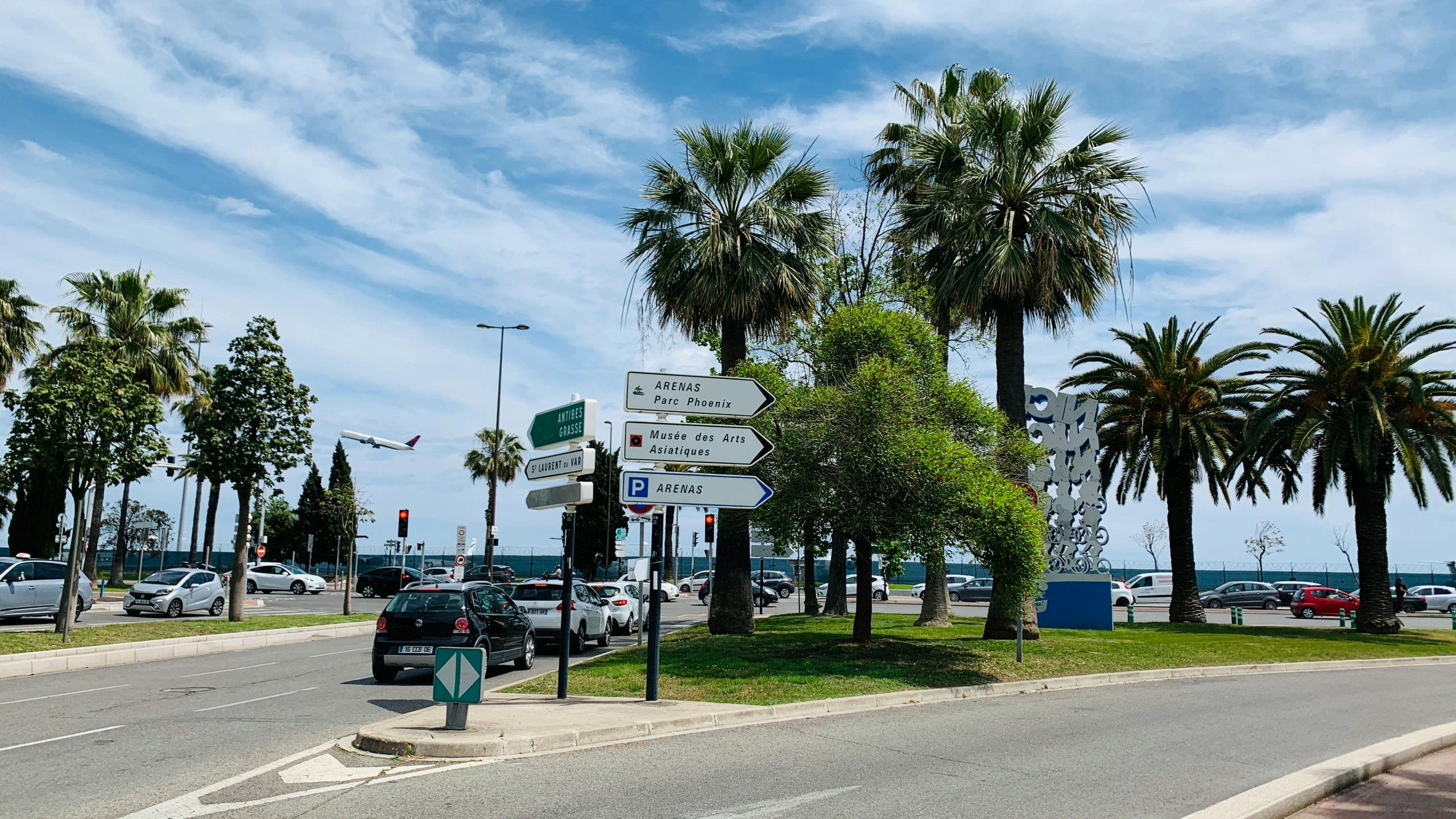 a street sign is shown on the side of the road