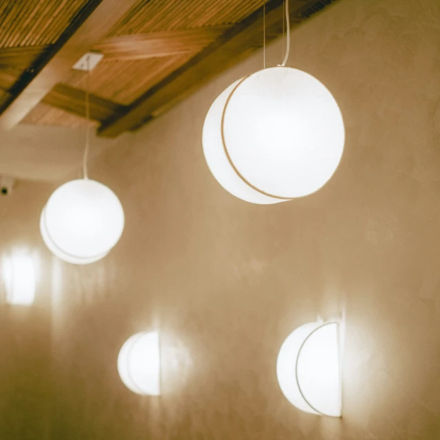 hanging balls hung from the ceiling of a room