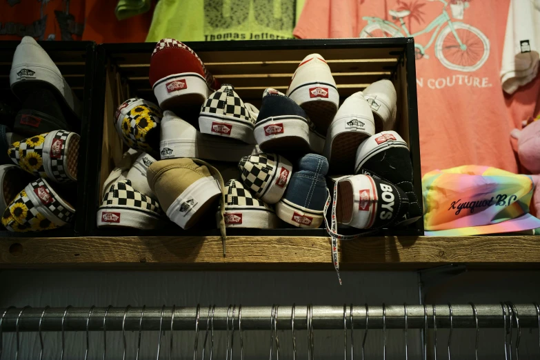 several pairs of s's tennis shoes are displayed