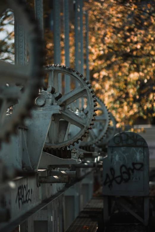 an old metal object next to a building