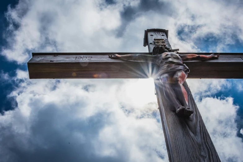 the crucifix is on top of a building