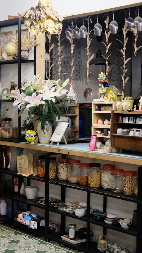 many food items sitting on shelves near one another