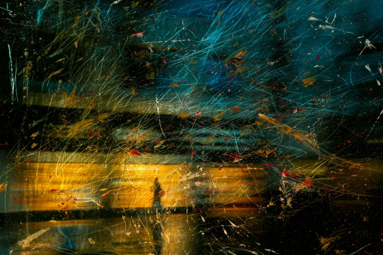 the inside of the car showing blurry image and rain