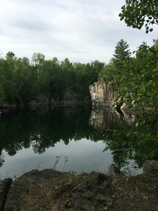 a water way with trees near by