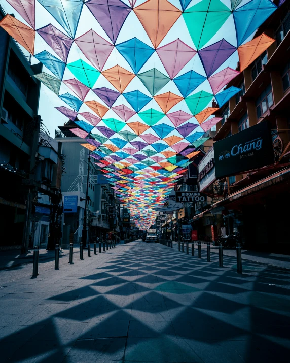 colorful overhead umbrellas suspended in a shopping mall