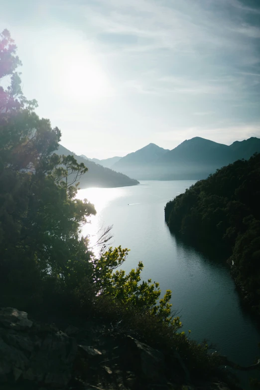 the view over the water from above on a cloudy day