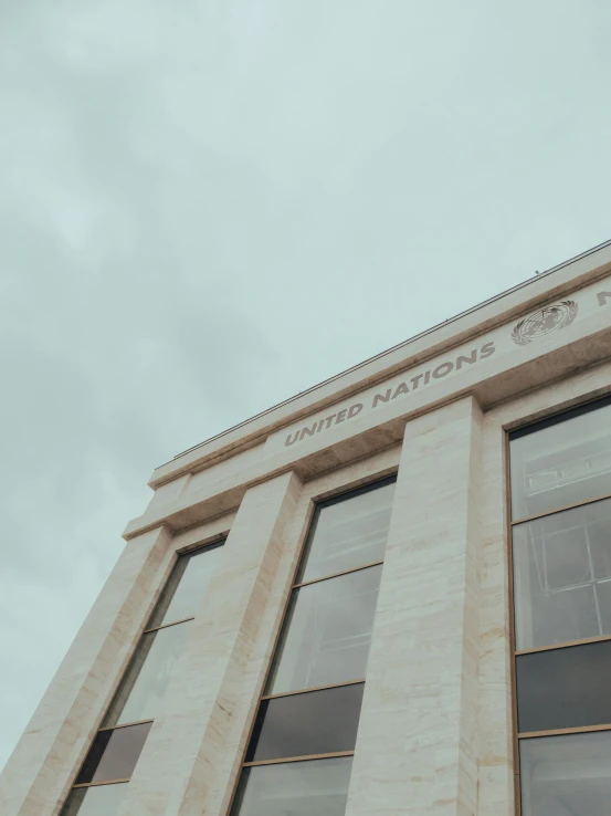 a closeup of the side of a building with many windows