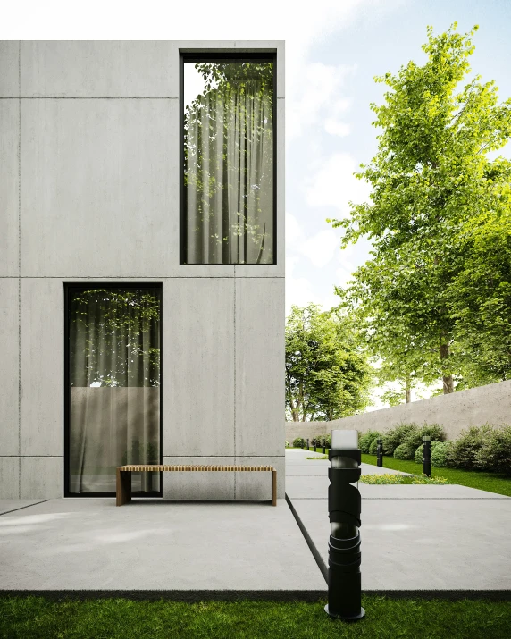 a bench sits in front of a grey building