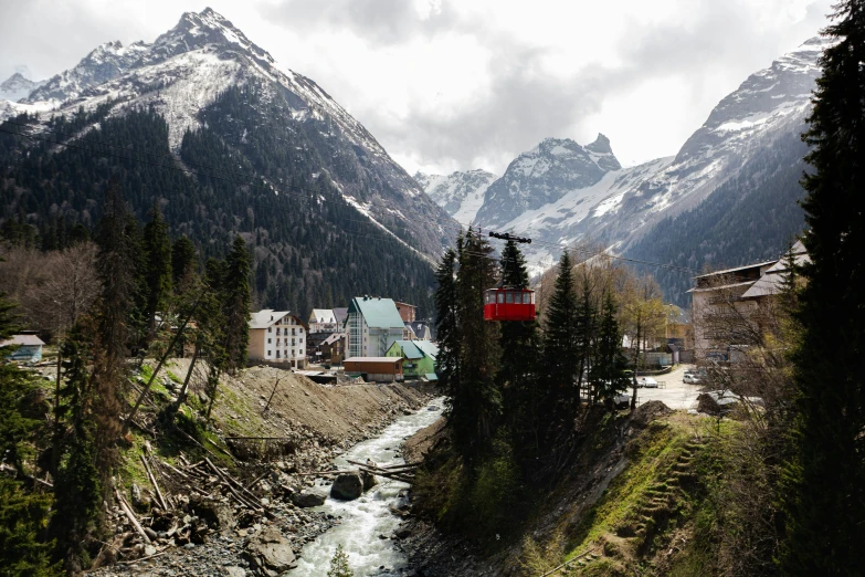 a town nestled between some beautiful green mountains