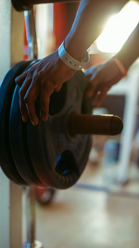 a man is holding a barbell with a cross - country bar