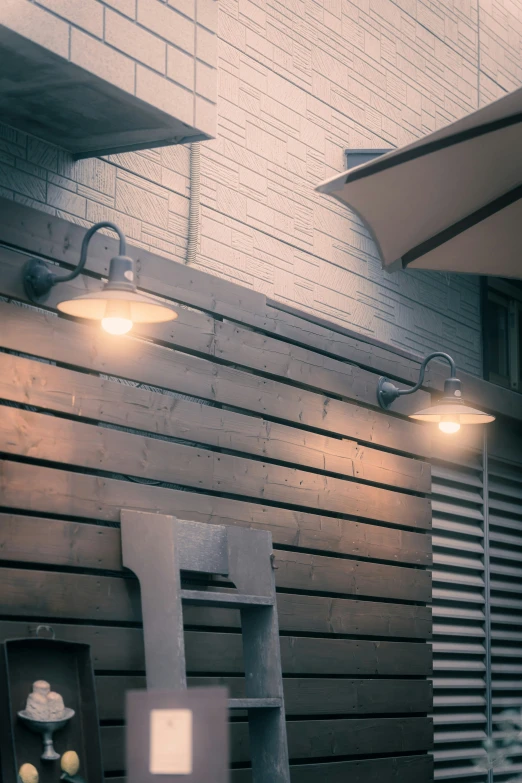 two umbrellas with lights on above a restaurant