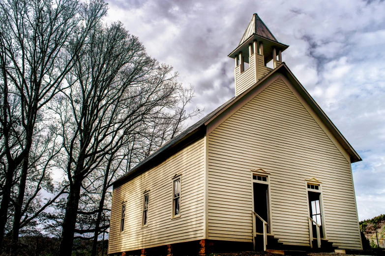 a white church with a clock tower