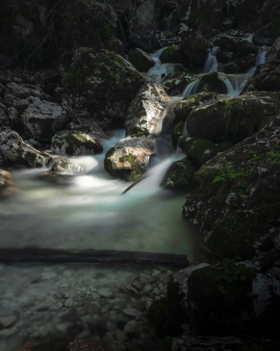 there is a river in the middle of a rocky river