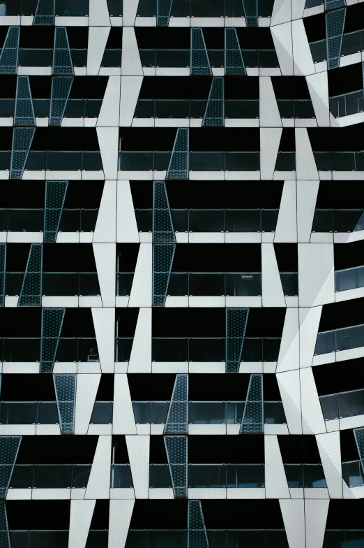 an angled pograph of a black and white building with arrows