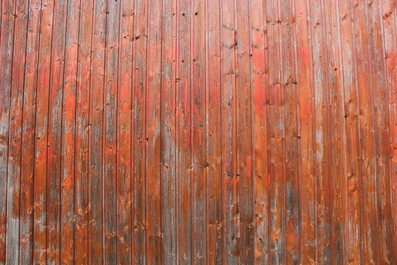 a large orange and red metal wall