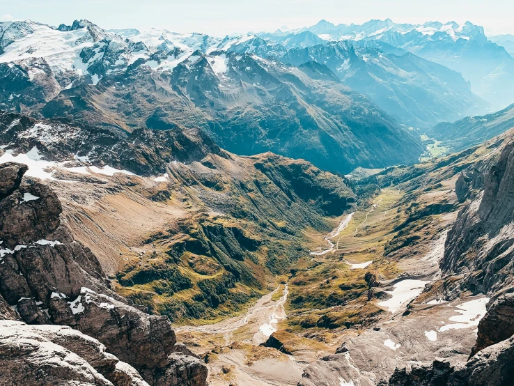 a mountain range with snow on the tops