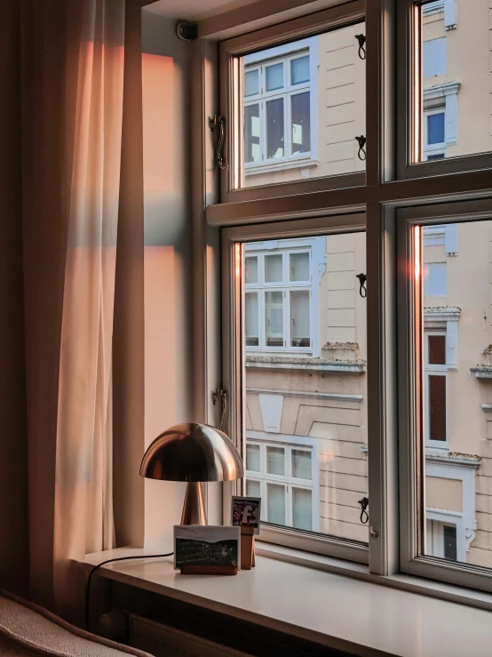 an image of a lamp sitting by a window