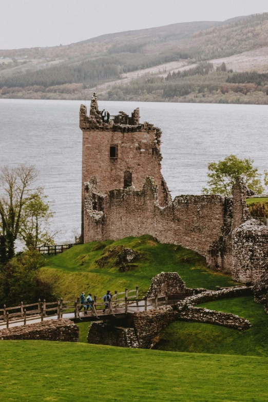 the ruins are beside a body of water