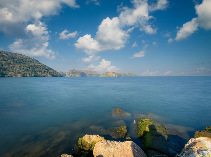 a large body of water surrounded by rocks