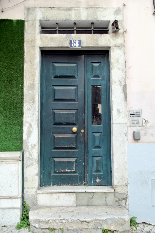 a door is shown against the building facade