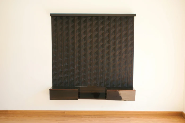 a modern window with a black pattern in the background