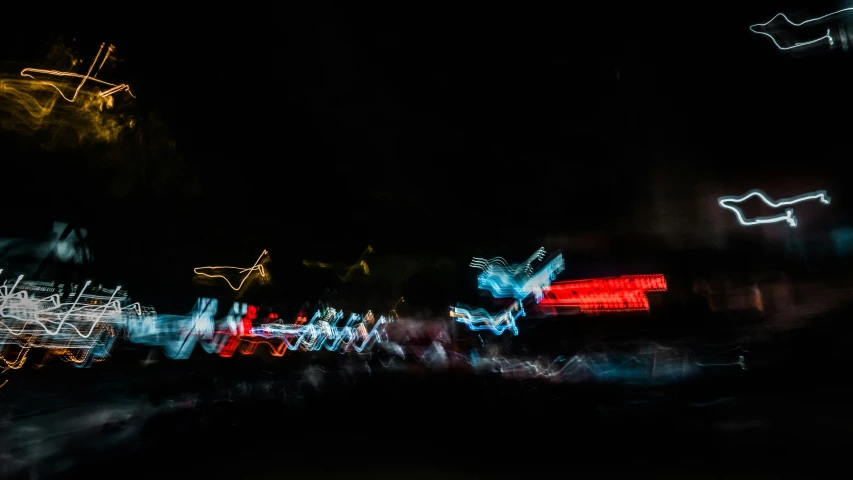 a night time picture of lights and motion blur