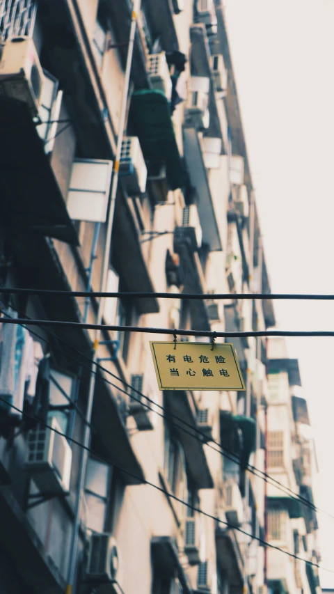 a street sign attached to the side of a building