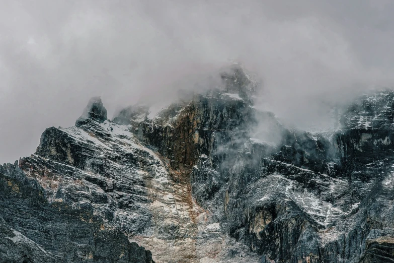 this is a very majestic mountain in the clouds