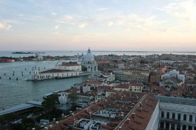 the view of some water from the top of buildings