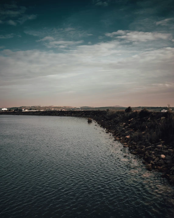 a body of water with some land on it