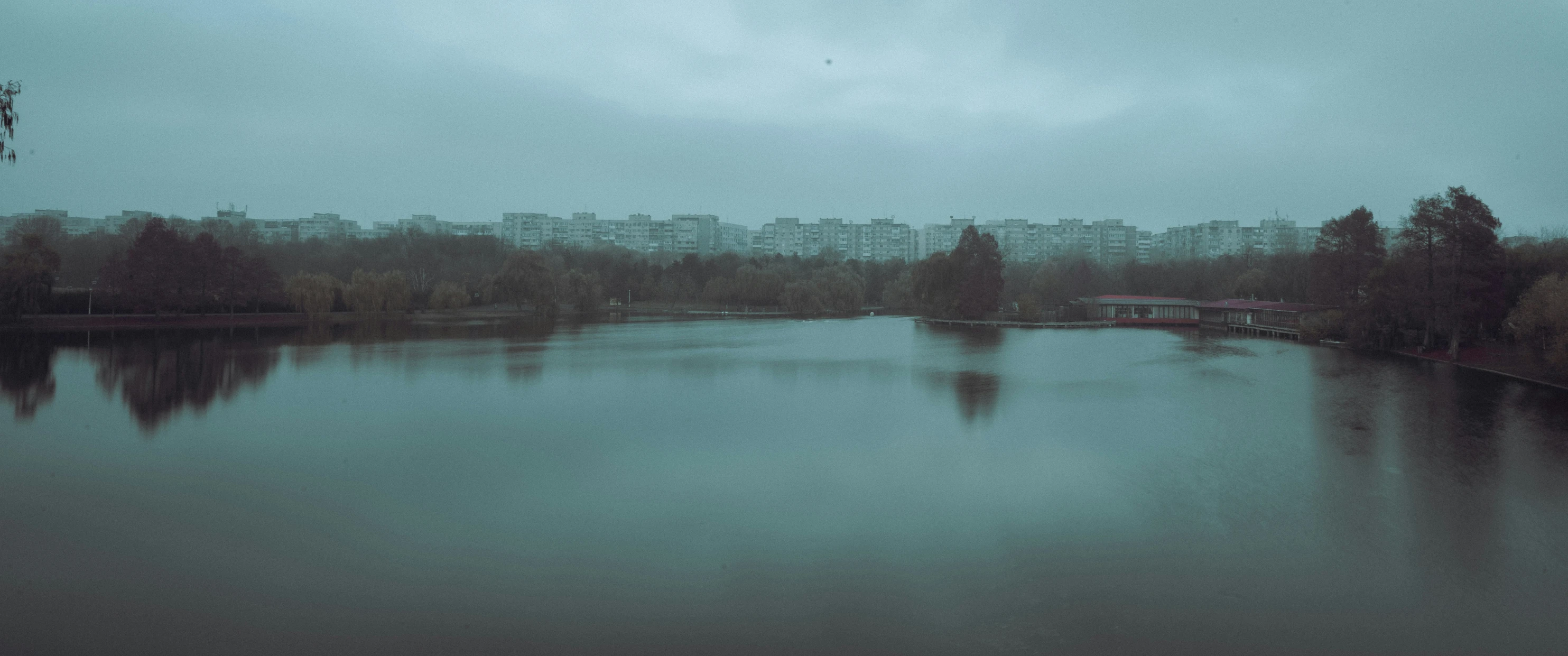 an empty pond with some water in it