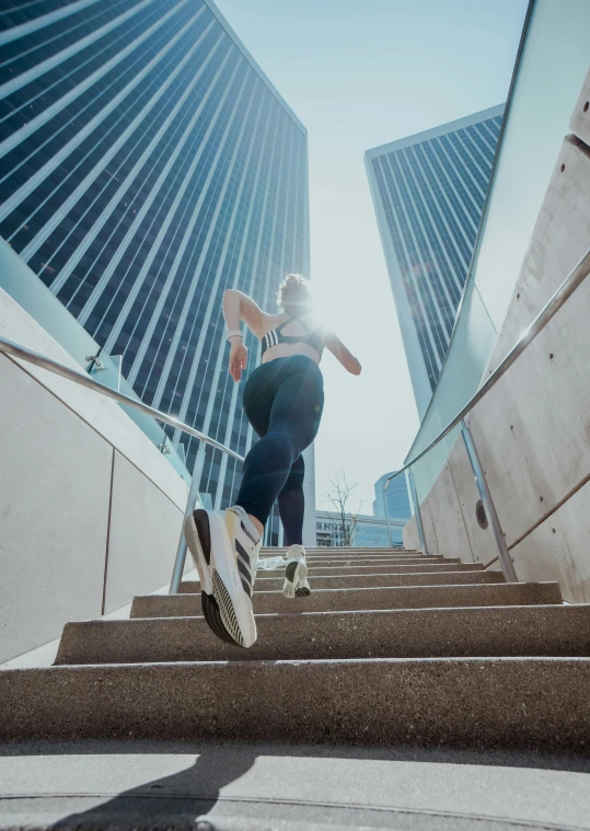 a person is doing a skateboard trick down some stairs