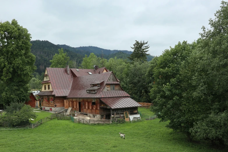 an image of a house in the middle of a field