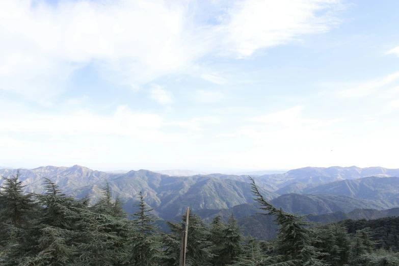 looking down into the woods and mountains from a high viewpoint