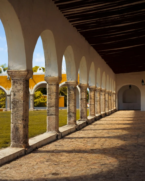 a row of arches at an outdoor courtyard