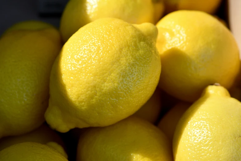 close up of fresh lemons are on display
