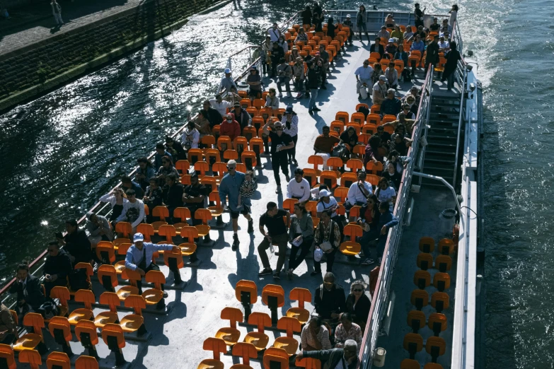 a large group of people with chairs in front of them