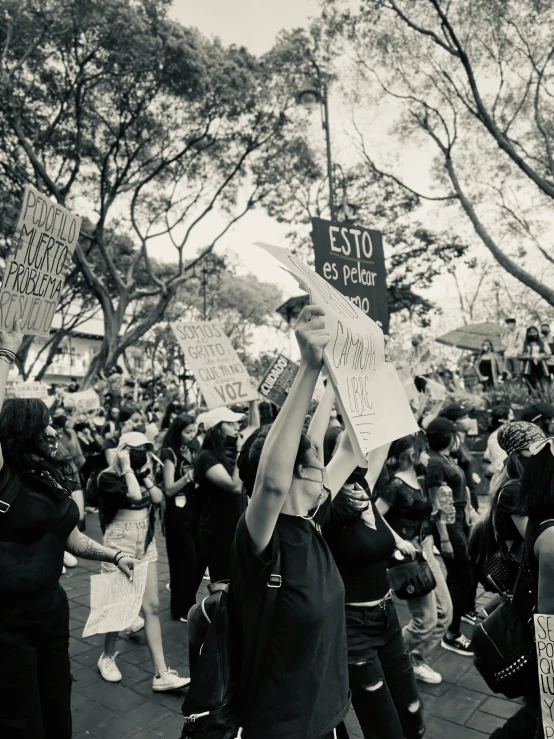 several people are protesting outside in protest