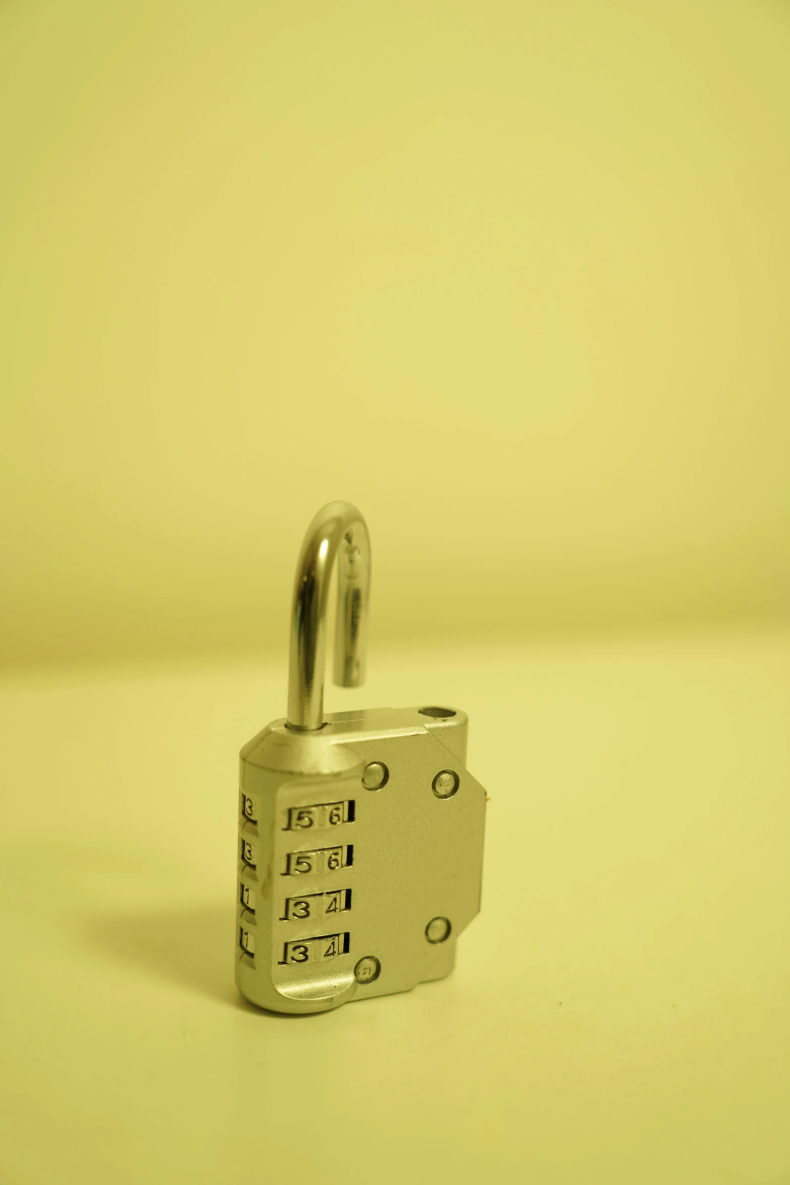 a metal padlock sitting on top of a table