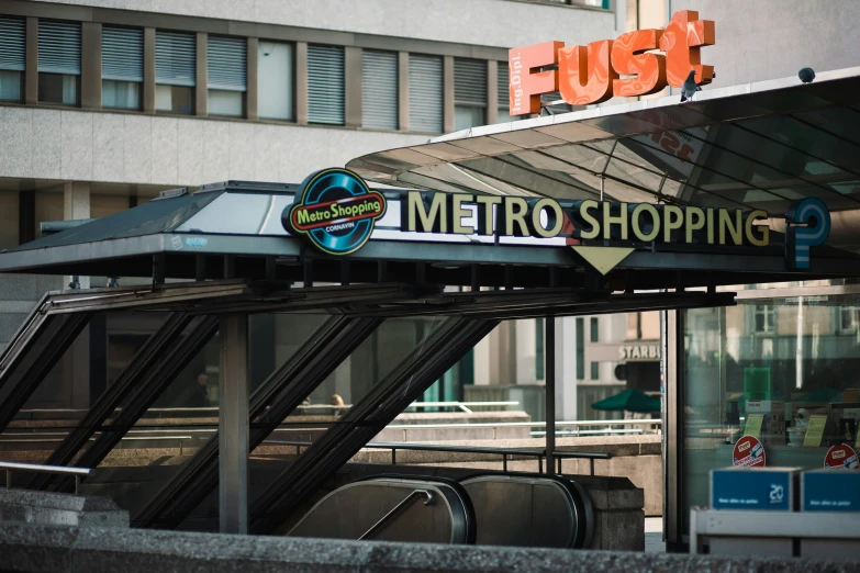 an airplane sits on top of a metro stop