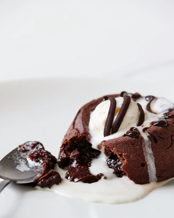 a chocolate cake with ice cream and chocolate cookies