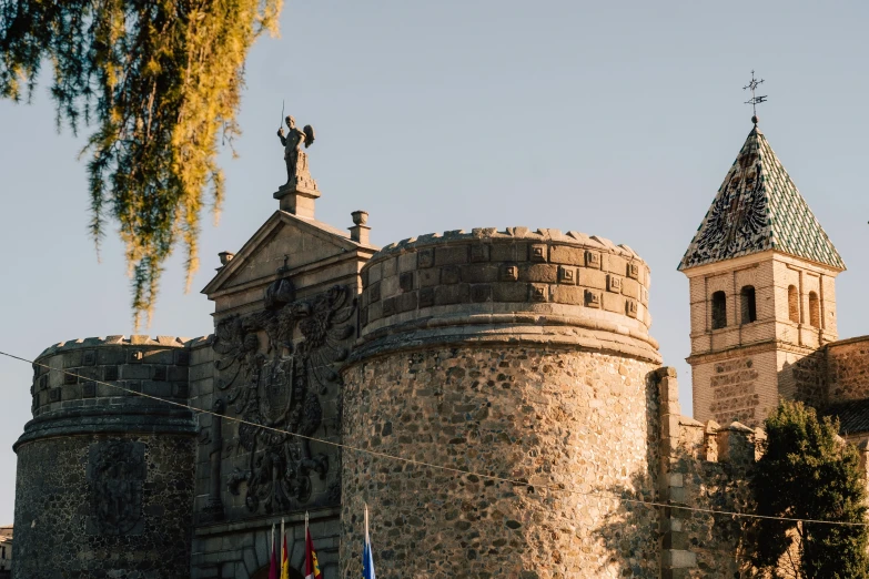 a tall castle like building with two clocks on it