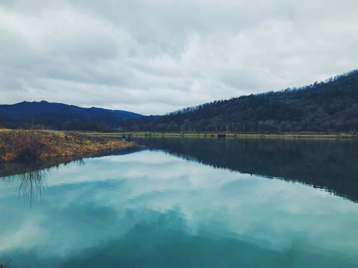 the water of the lake is clear and very blue