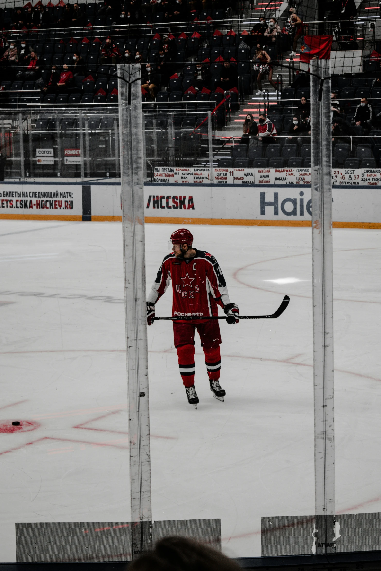 there is an ice hockey player on the rink