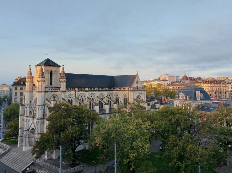 a tall cathedral in the city has spires