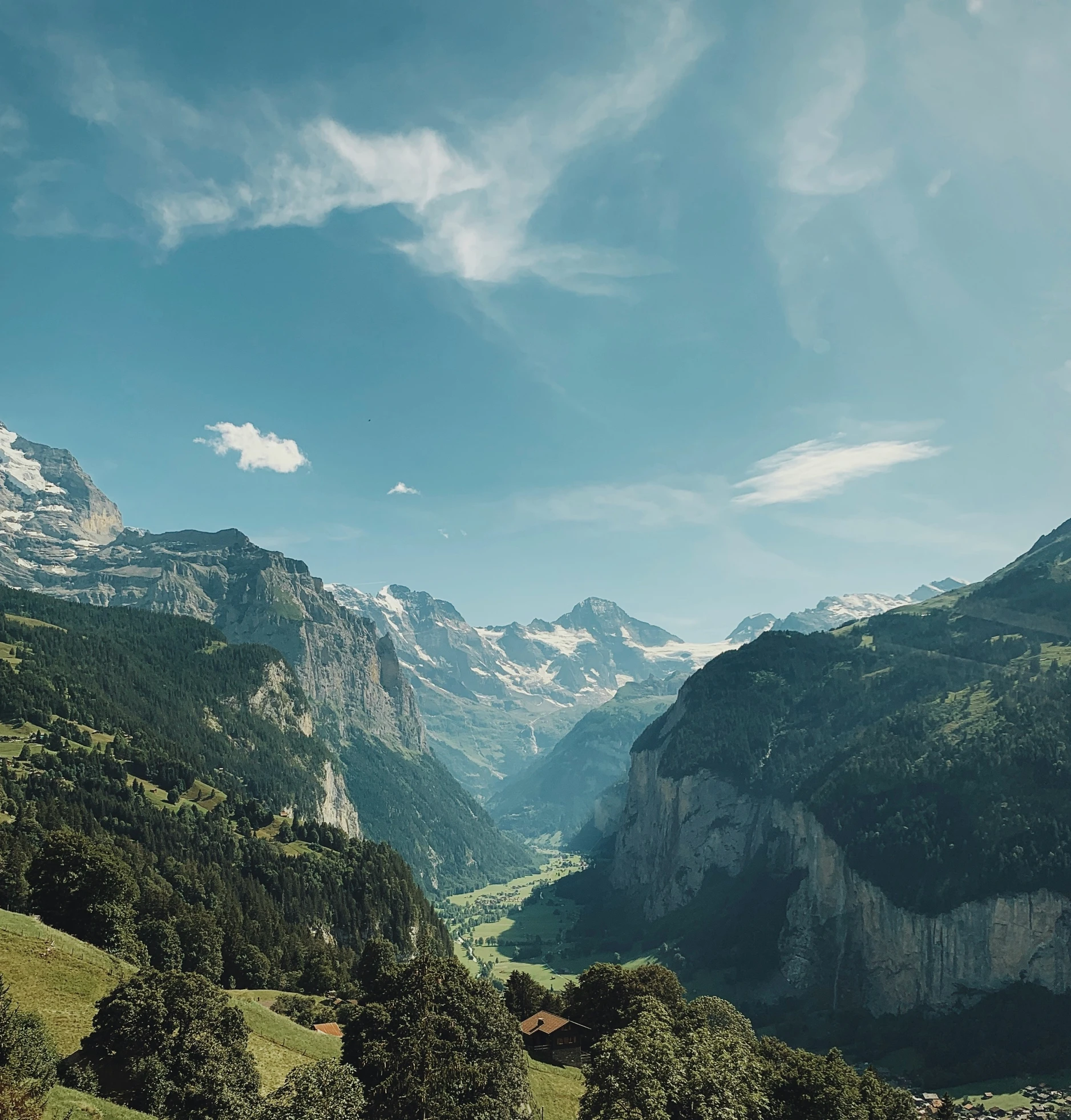 a mountainous view of mountains, valleys and a mountain pass